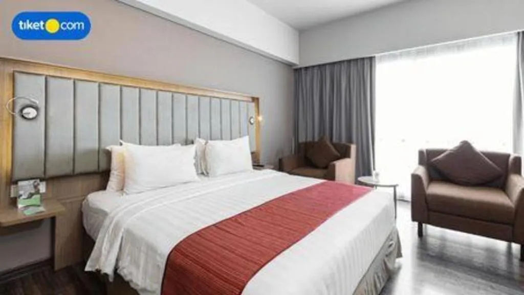 Bed in Gammara Hotel Makassar