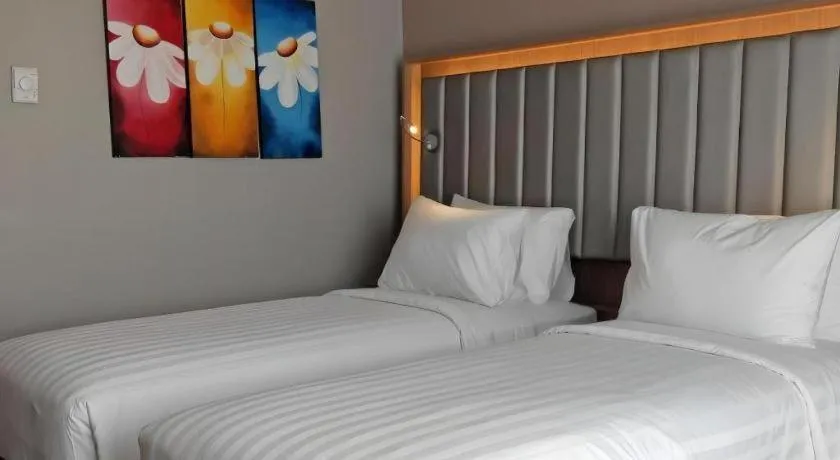 Bed in Gammara Hotel Makassar