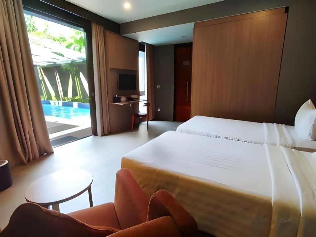 Bed in Gammara Hotel Makassar