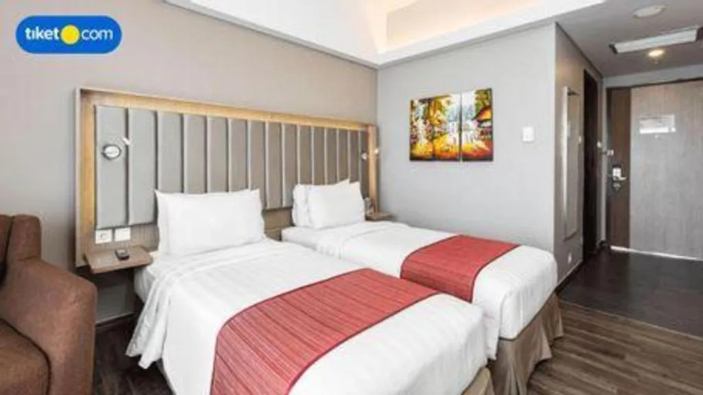 Bed in Gammara Hotel Makassar