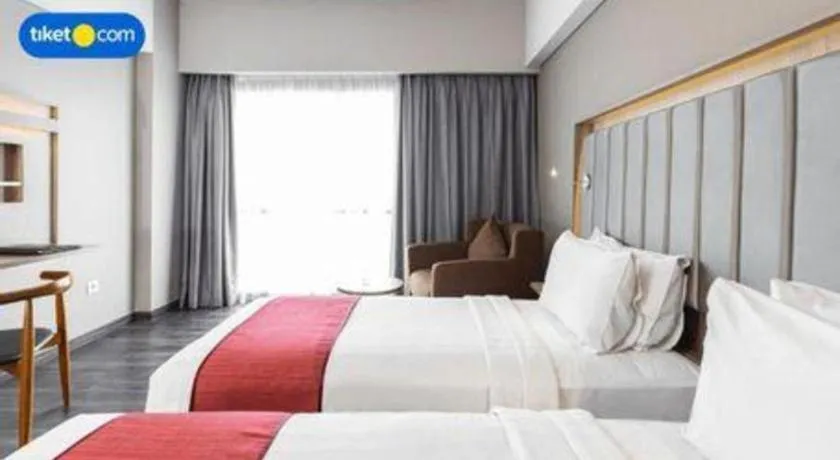 Bed in Gammara Hotel Makassar