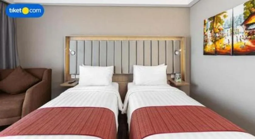 Bed in Gammara Hotel Makassar