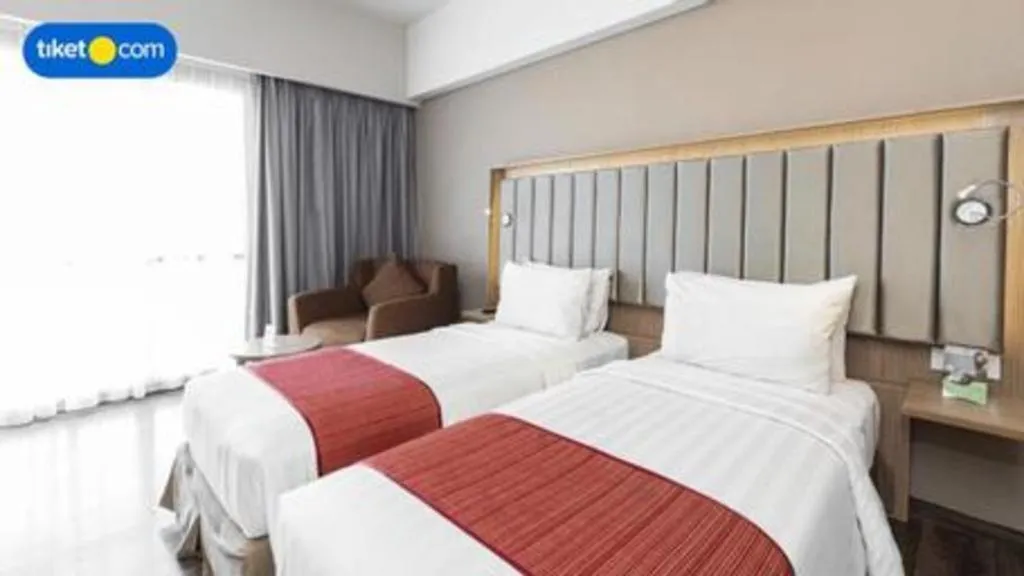 Bed in Gammara Hotel Makassar