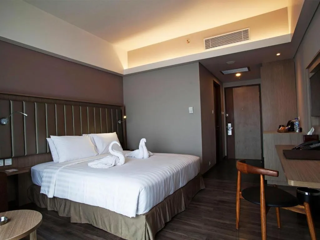 Bed in Gammara Hotel Makassar