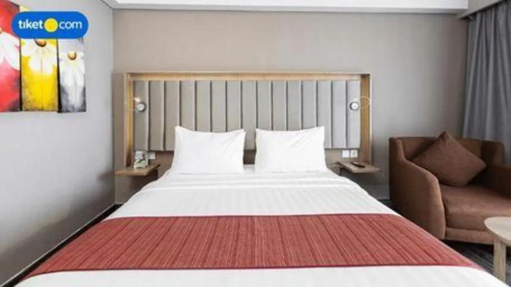 Bed in Gammara Hotel Makassar