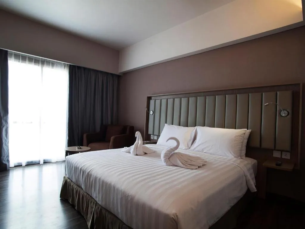 Bed in Gammara Hotel Makassar