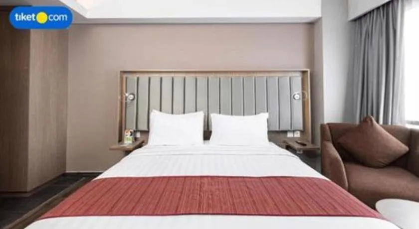 Bed in Gammara Hotel Makassar