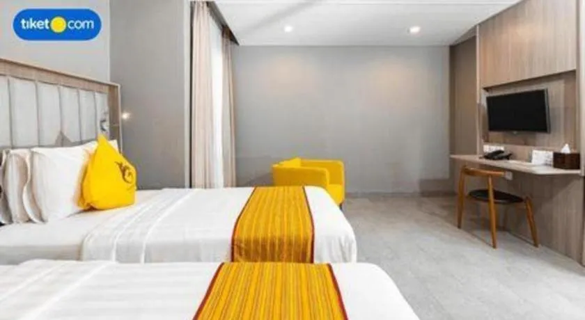 Bed in Gammara Hotel Makassar