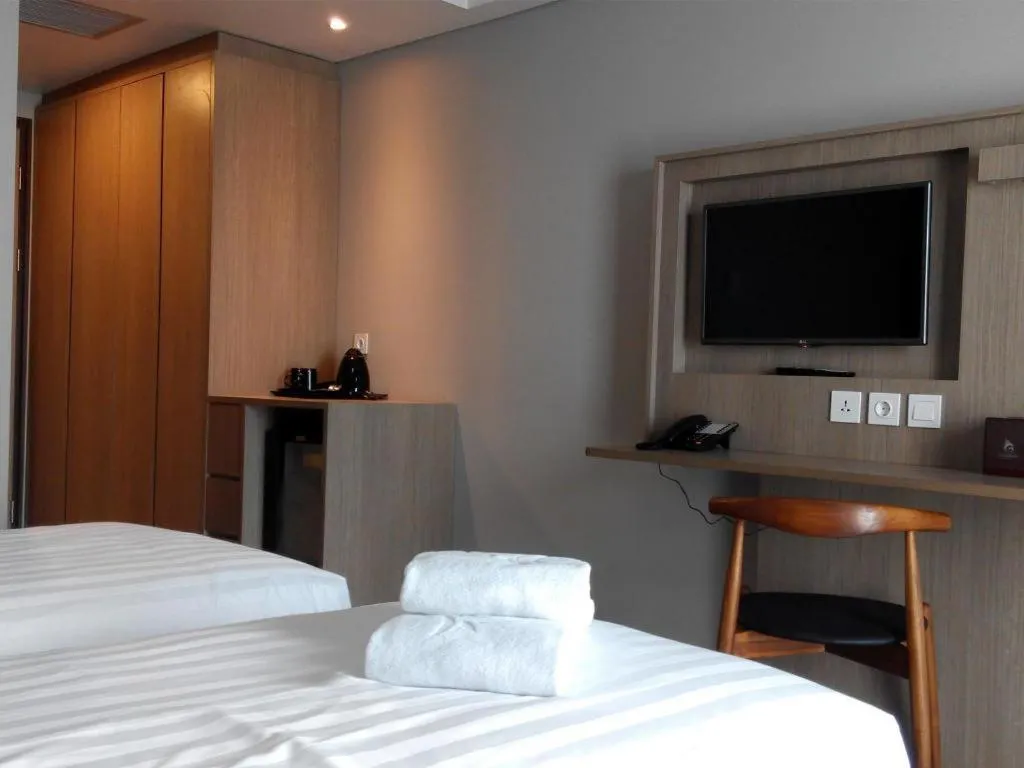 Bed in Gammara Hotel Makassar