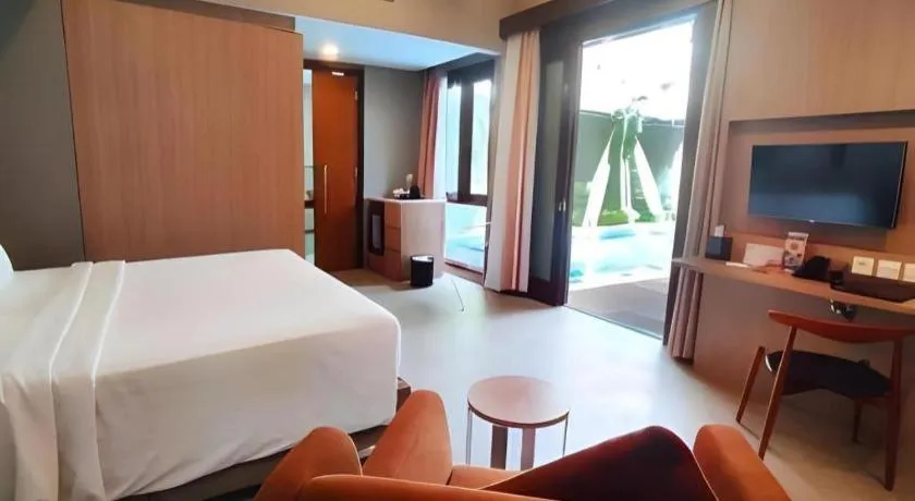 Bed in Gammara Hotel Makassar