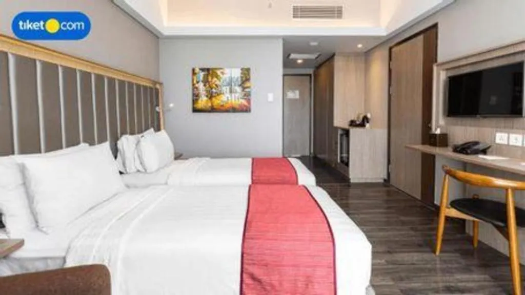 Bed in Gammara Hotel Makassar