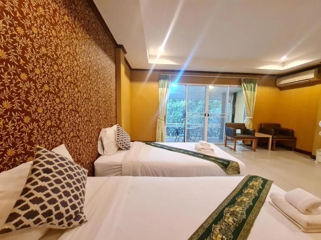 Bed in Khaoyai Kirithantip Resort