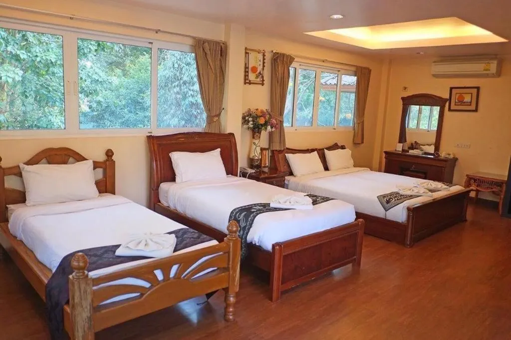 Bed in Khaoyai Kirithantip Resort