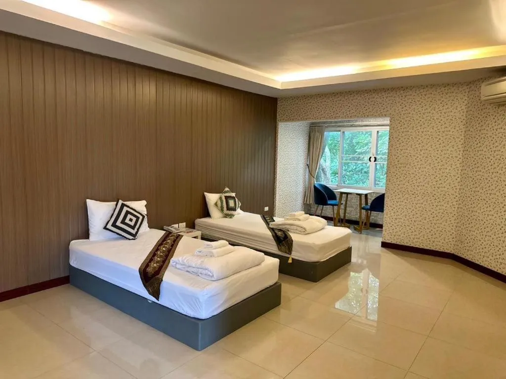 Bed in Khaoyai Kirithantip Resort