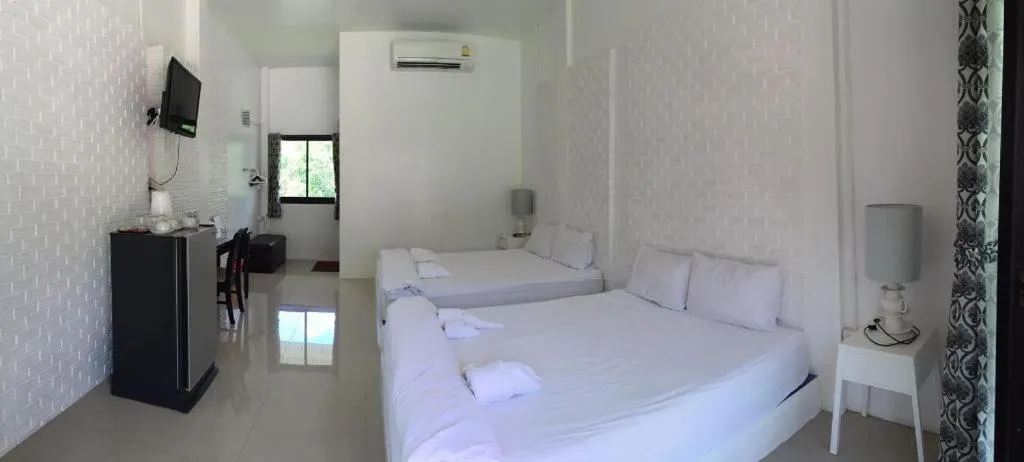 Bed in The Lighthouse Resort at Chanthaburi