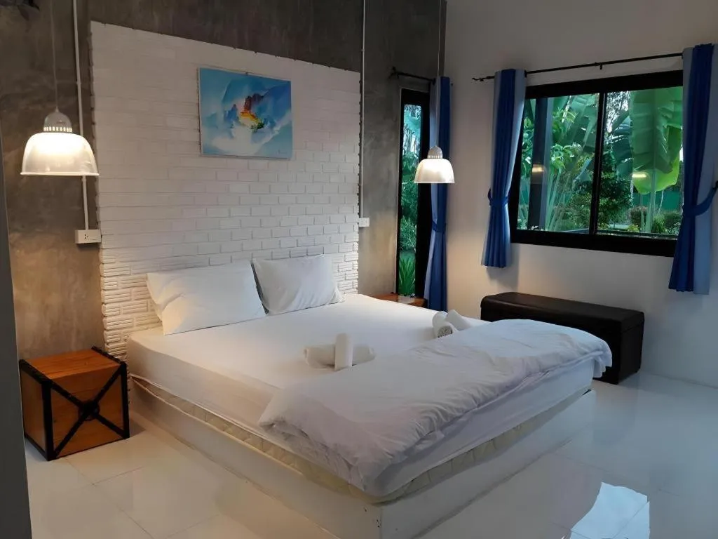 Bed in The Lighthouse Resort at Chanthaburi