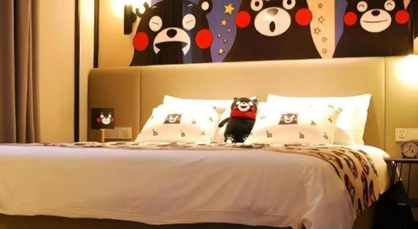 Bed in Magnotel Hotel Shanghai Jinjiang Park Branch