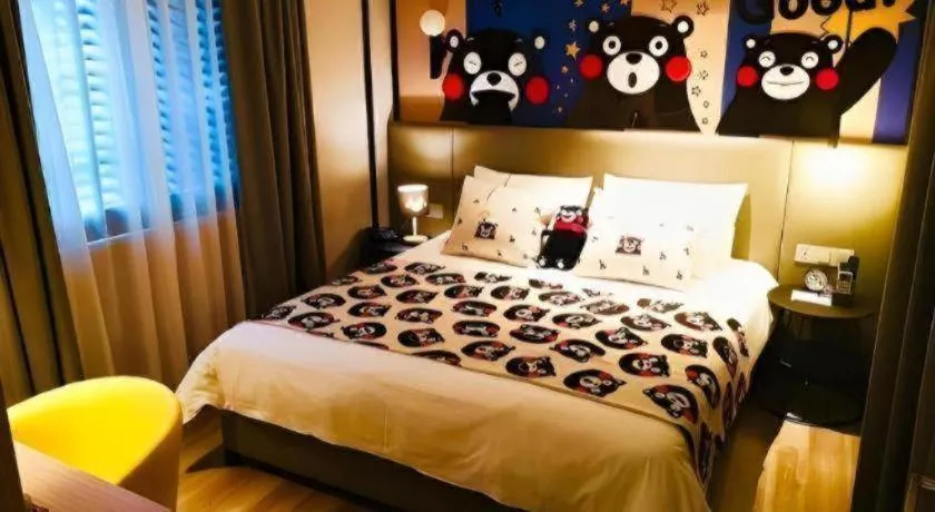 Bed in Magnotel Hotel Shanghai Jinjiang Park Branch