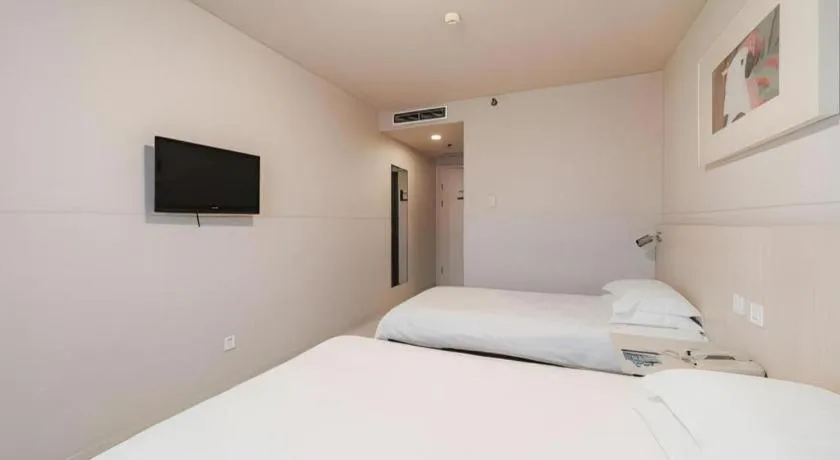 Bed in Jinjiang Inn Beijing Capital International Airport New Expo Metro Station