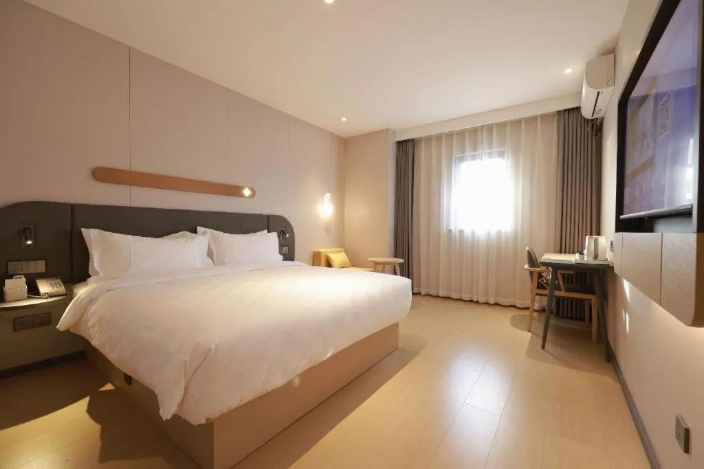 Bed in Jinjiang Inn Beijing Capital International Airport New Expo Metro Station