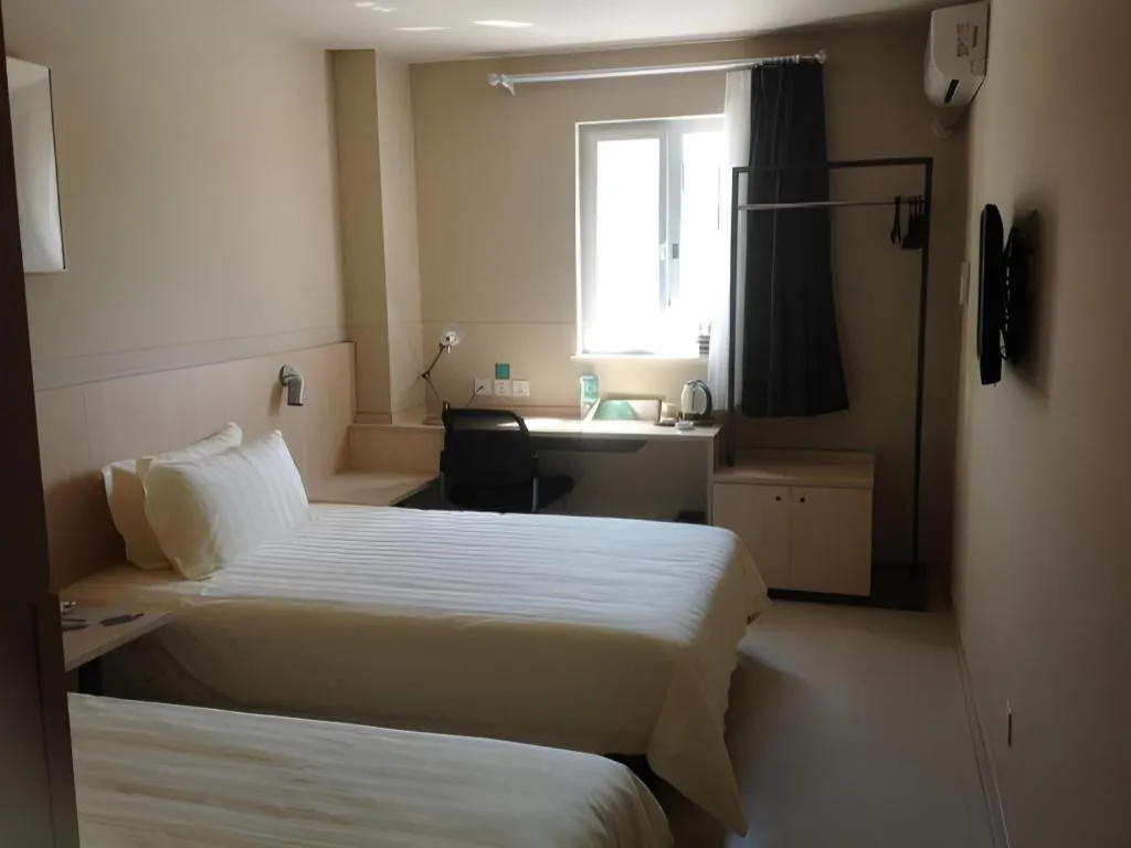 Bed in Jinjiang Inn Beijing Capital International Airport New Expo Metro Station