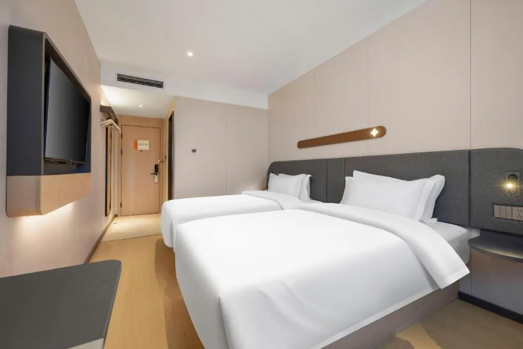 Bed in Jinjiang Inn Beijing Capital International Airport New Expo Metro Station