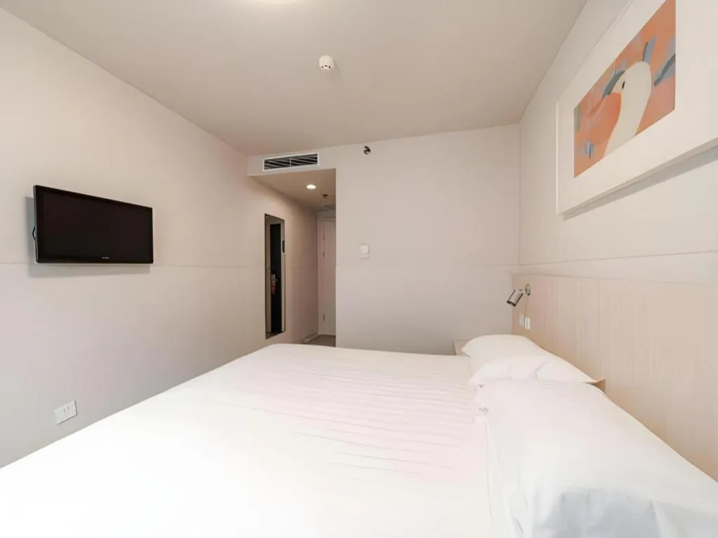 Bed in Jinjiang Inn Beijing Capital International Airport New Expo Metro Station