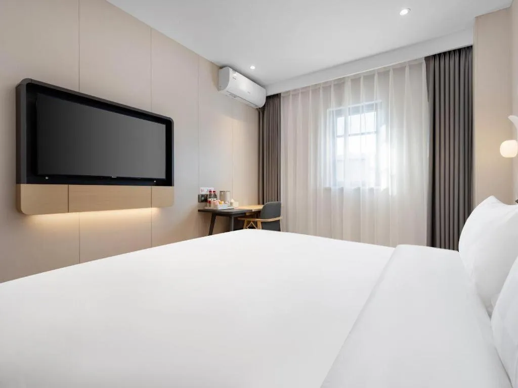 Bed in Jinjiang Inn Beijing Capital International Airport New Expo Metro Station