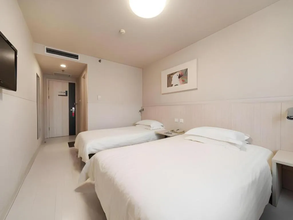 Bed in Jinjiang Inn Beijing Capital International Airport New Expo Metro Station