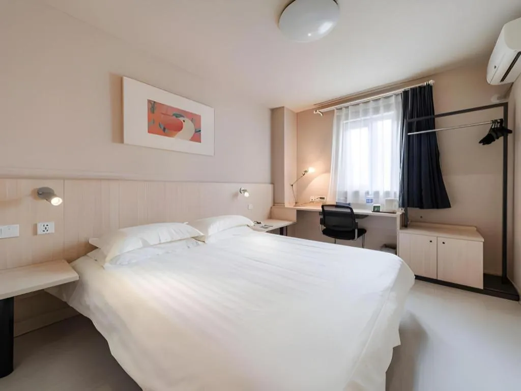 Bed in Jinjiang Inn Beijing Capital International Airport New Expo Metro Station