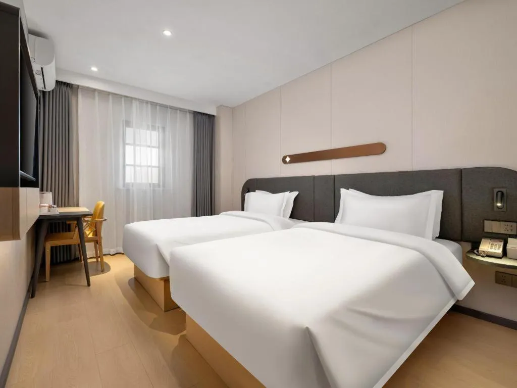 Bed in Jinjiang Inn Beijing Capital International Airport New Expo Metro Station