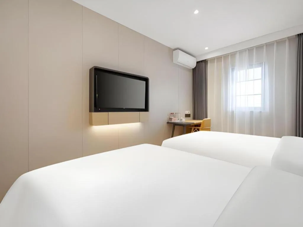 Bed in Jinjiang Inn Beijing Capital International Airport New Expo Metro Station