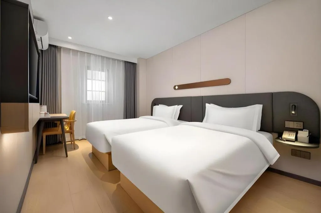 Bed in Jinjiang Inn Beijing Capital International Airport New Expo Metro Station