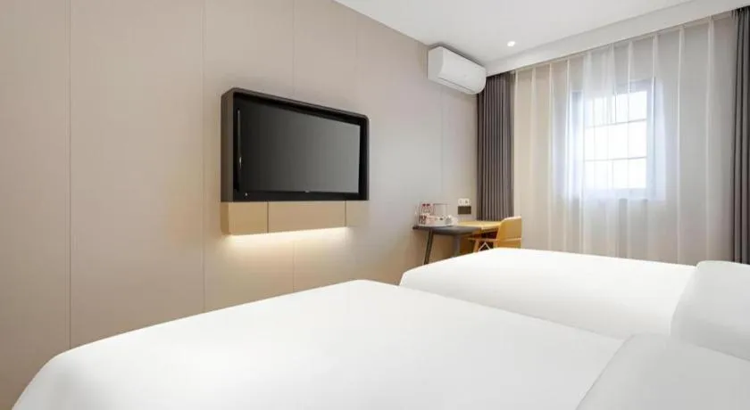 Bed in Jinjiang Inn Beijing Capital International Airport New Expo Metro Station