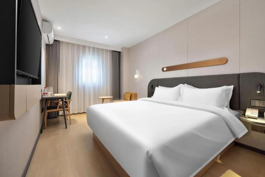 Bed in Jinjiang Inn Beijing Capital International Airport New Expo Metro Station