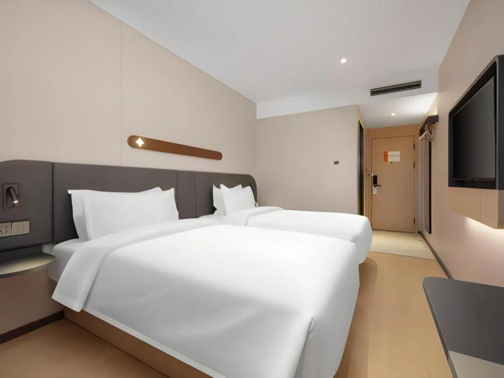 Bed in Jinjiang Inn Beijing Capital International Airport New Expo Metro Station