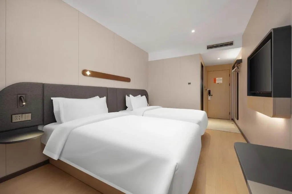 Bed in Jinjiang Inn Beijing Capital International Airport New Expo Metro Station