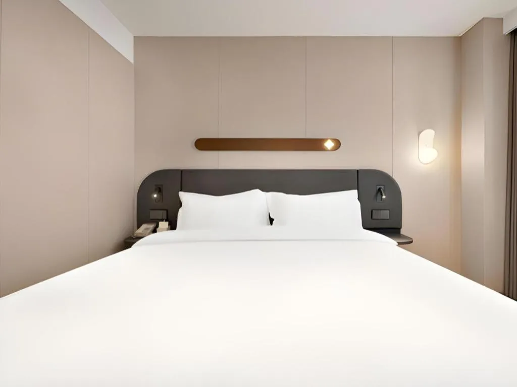 Bed in Jinjiang Inn Beijing Capital International Airport New Expo Metro Station