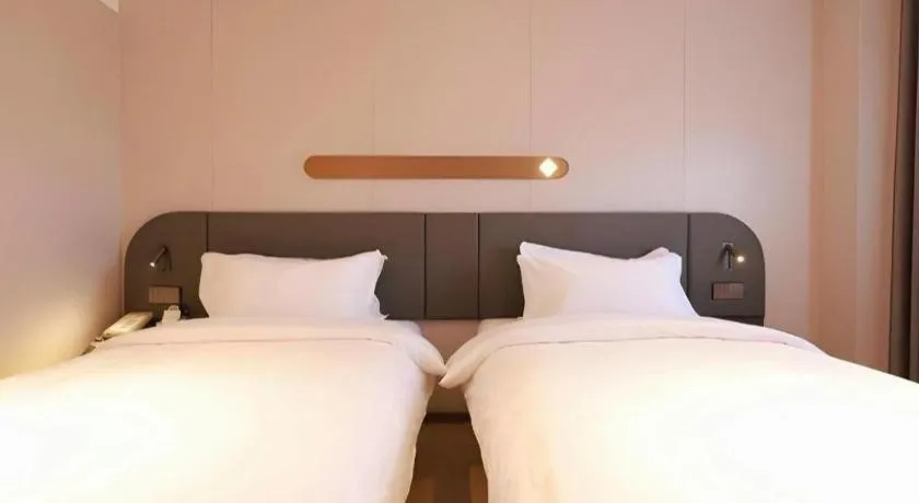 Bed in Jinjiang Inn Beijing Capital International Airport New Expo Metro Station