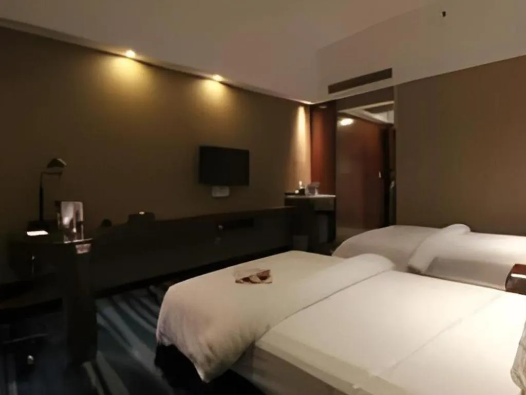 Bed in Metropolo Hotel Hefei Baohe Wandabao Park Metro Station