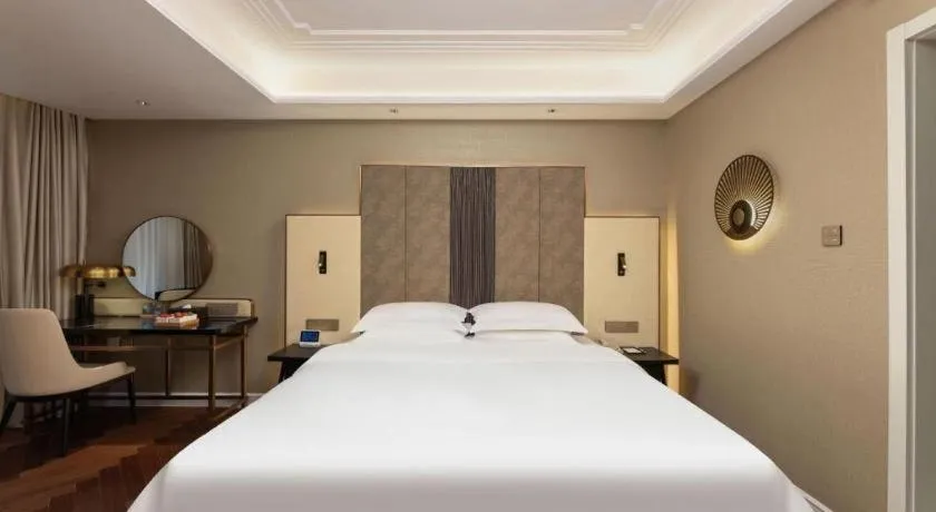 Bed in Metropolo Hotel Hefei Baohe Wandabao Park Metro Station