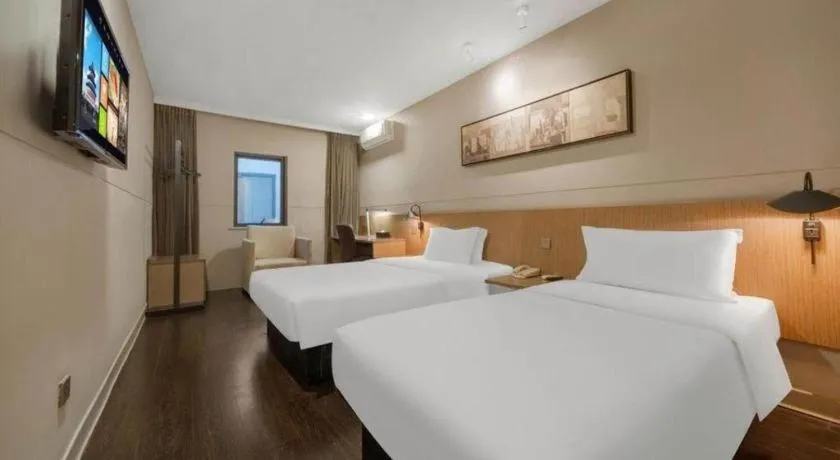 Bed in Jinjiang Inn Select Shanghai Expo Park Dezhou Road