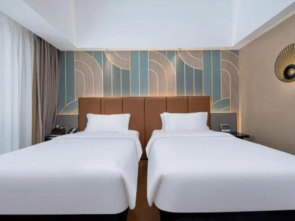 Bed in Jinjiang Metropolo Hotel - Ningde Wanda Plaza