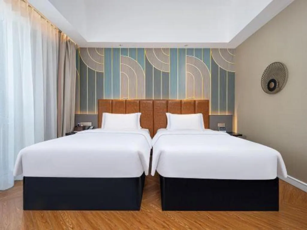 Bed in Jinjiang Metropolo Hotel - Ningde Wanda Plaza