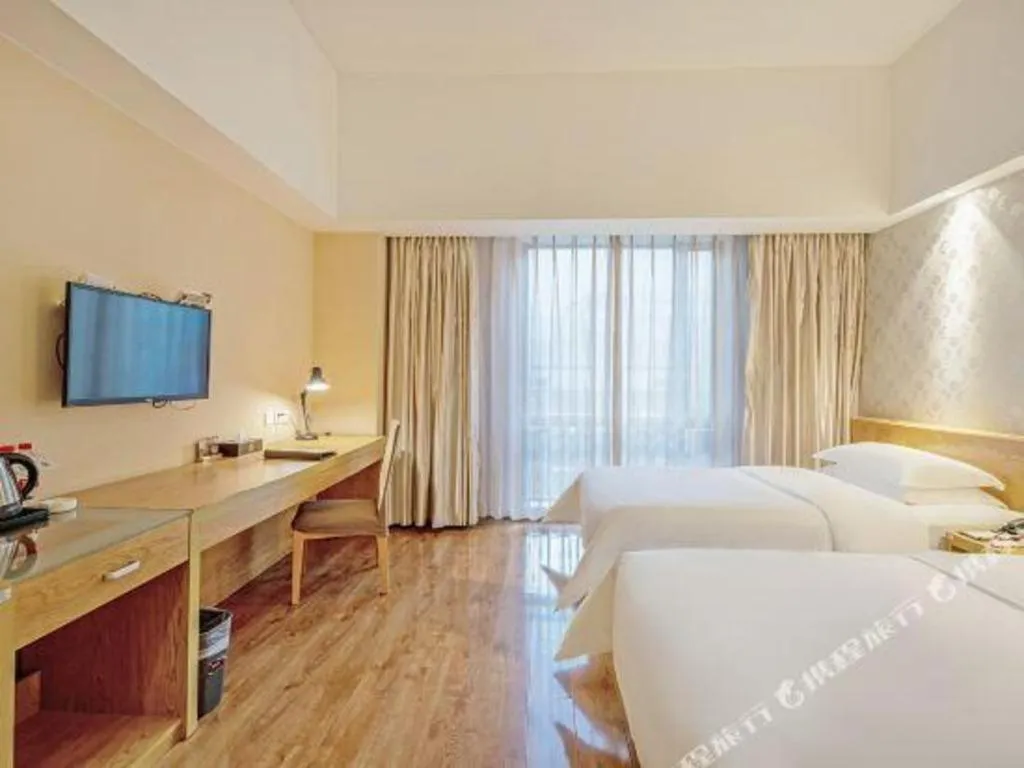Bed in Jinjiang Metropolo Hotel - Ningde Wanda Plaza