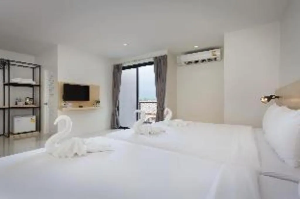 Bed in Le Park Hotel