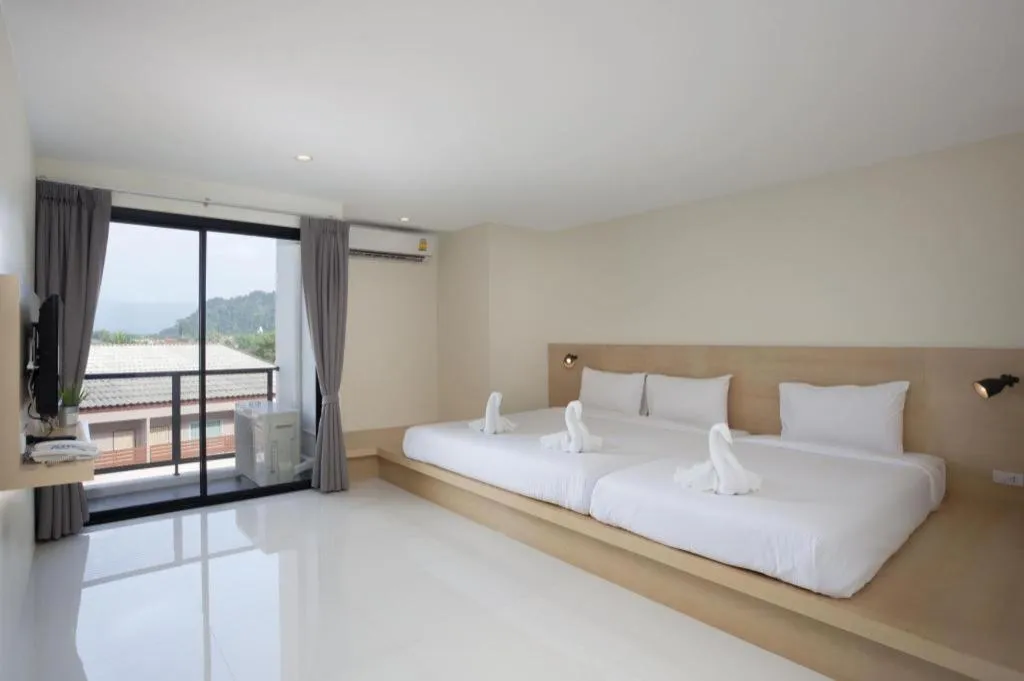 Bed in Le Park Hotel