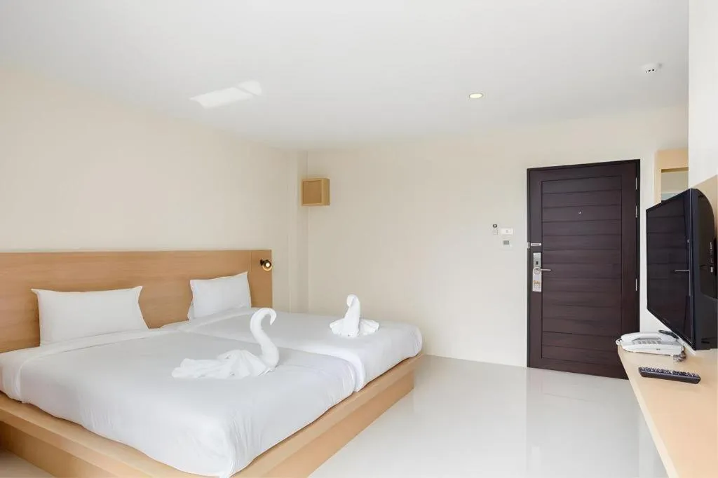 Bed in Le Park Hotel