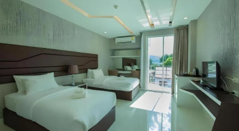 Bed in Phuglong Hotel