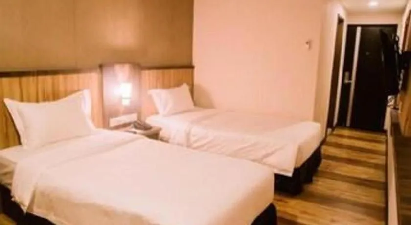 Bed in The Golden Bay Hotel Batam